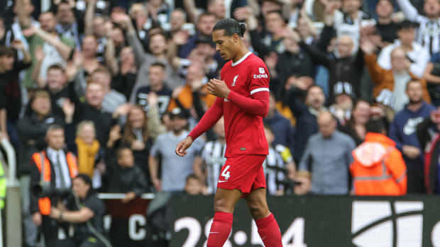 Liverpool captain Virgil van Dijk pictured leaving the field after being sent off against Newcastle in August 2023